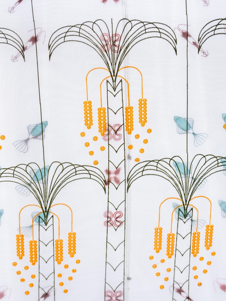 Detail of embroidered date palms with golden fruit clusters on translucent mesh, part of the botanical documentation of Nabih Saleh island