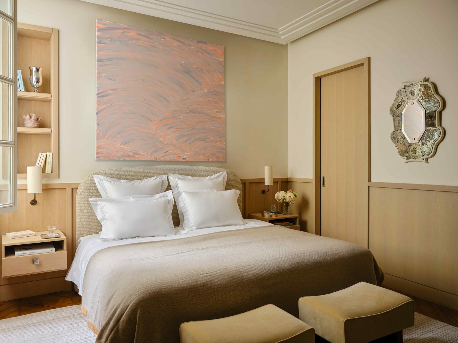The abstract art piece by French artist Hugo Capron takes centre stage in the main bedroom