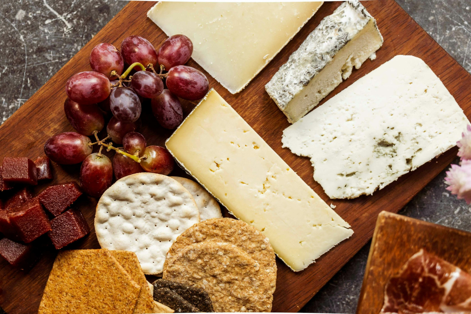 Creamy, tangy and visually inviting, cheeseboards encourage lingering and conversation at Christmas gatherings (Photo: Edward Howell/Unsplash)