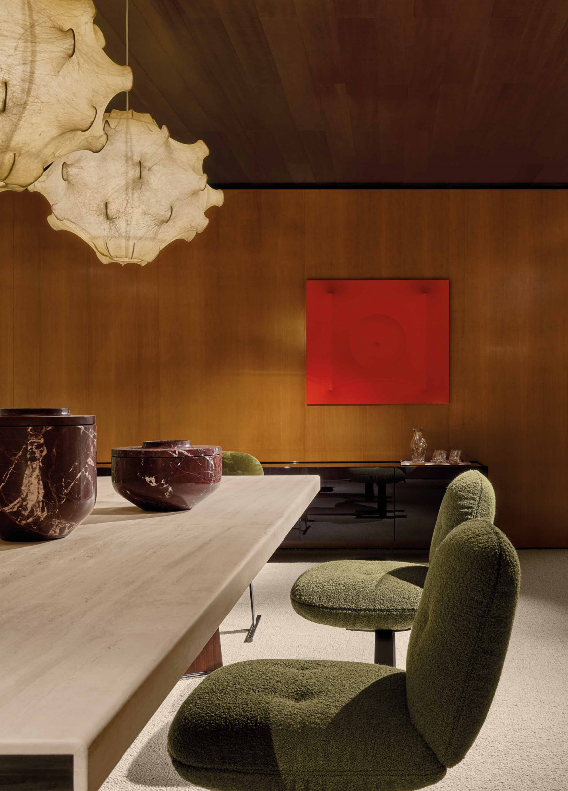 The Libra armchair by Giampiero Tagliaferri for Minotti adds a refined yet inviting presence to spaces designed for gathering