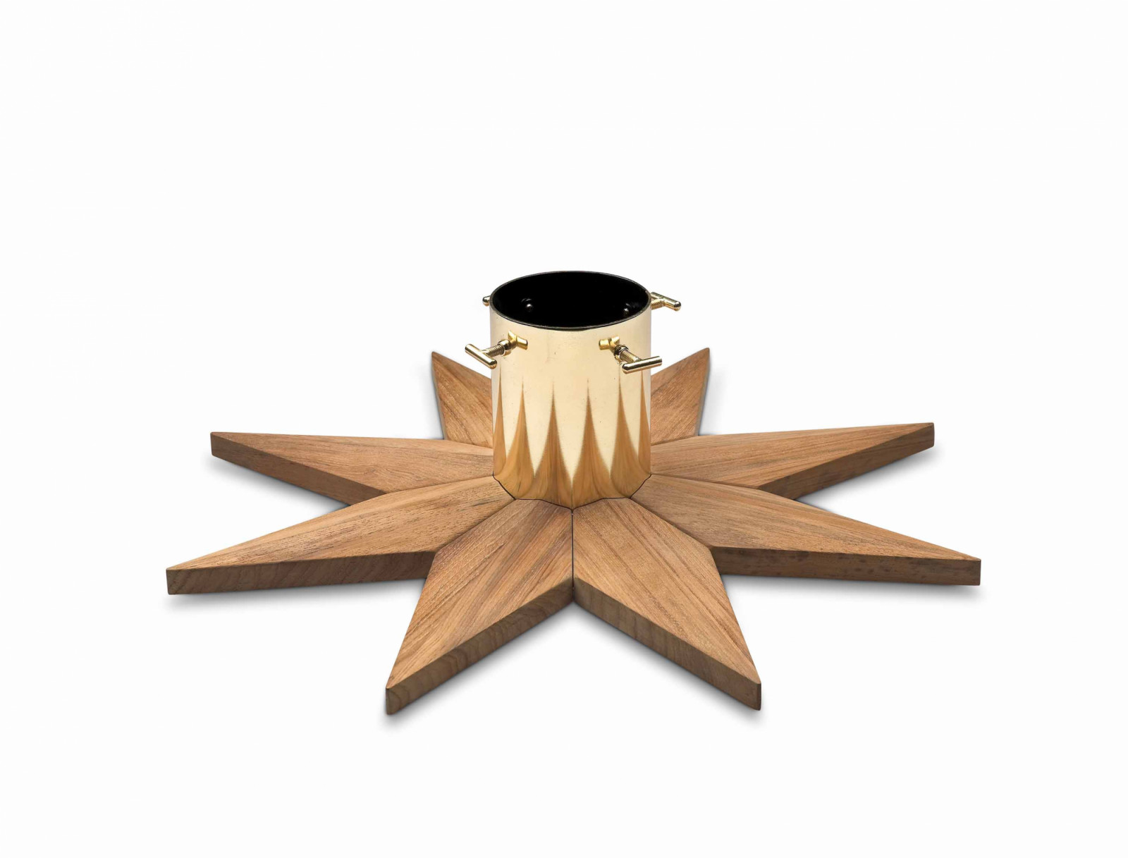 Crafted in teak, the Skagerak Stella Christmas tree base by Fritz Hansen anchors festive decor with understated Scandinavian elegance