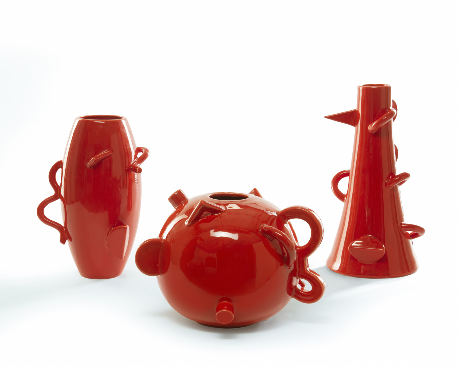 The Dealbata vases by Zanotta, designed by Alessandro Mendini, translate botanical forms into sculptural glass objects that bring colour and character to festive displays