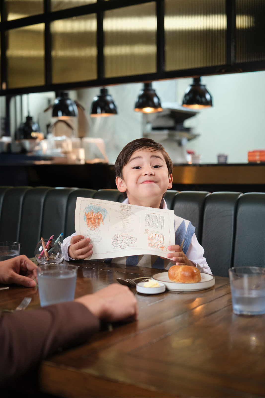 The family guide to exploring Newport World Resorts: this little guy has fun colouring while waiting for his tasty meal from Gordon Ramsay Bar & Grill