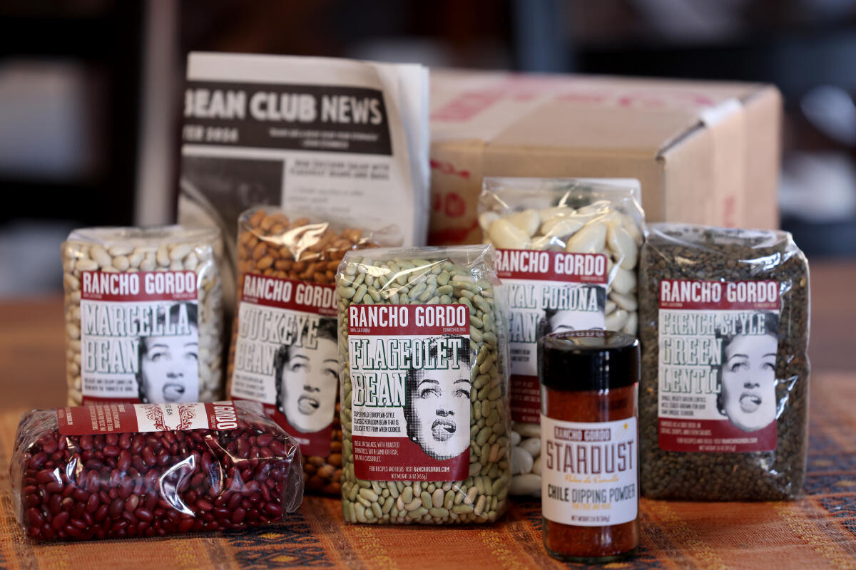A current quarterly Bean Club shipment of six bags of assorted beans and chili dipping powder at the Rancho Gordo retail store in Napa Wednesday, Aug. 28, 2024. (Beth Schlanker / The Press Democrat)