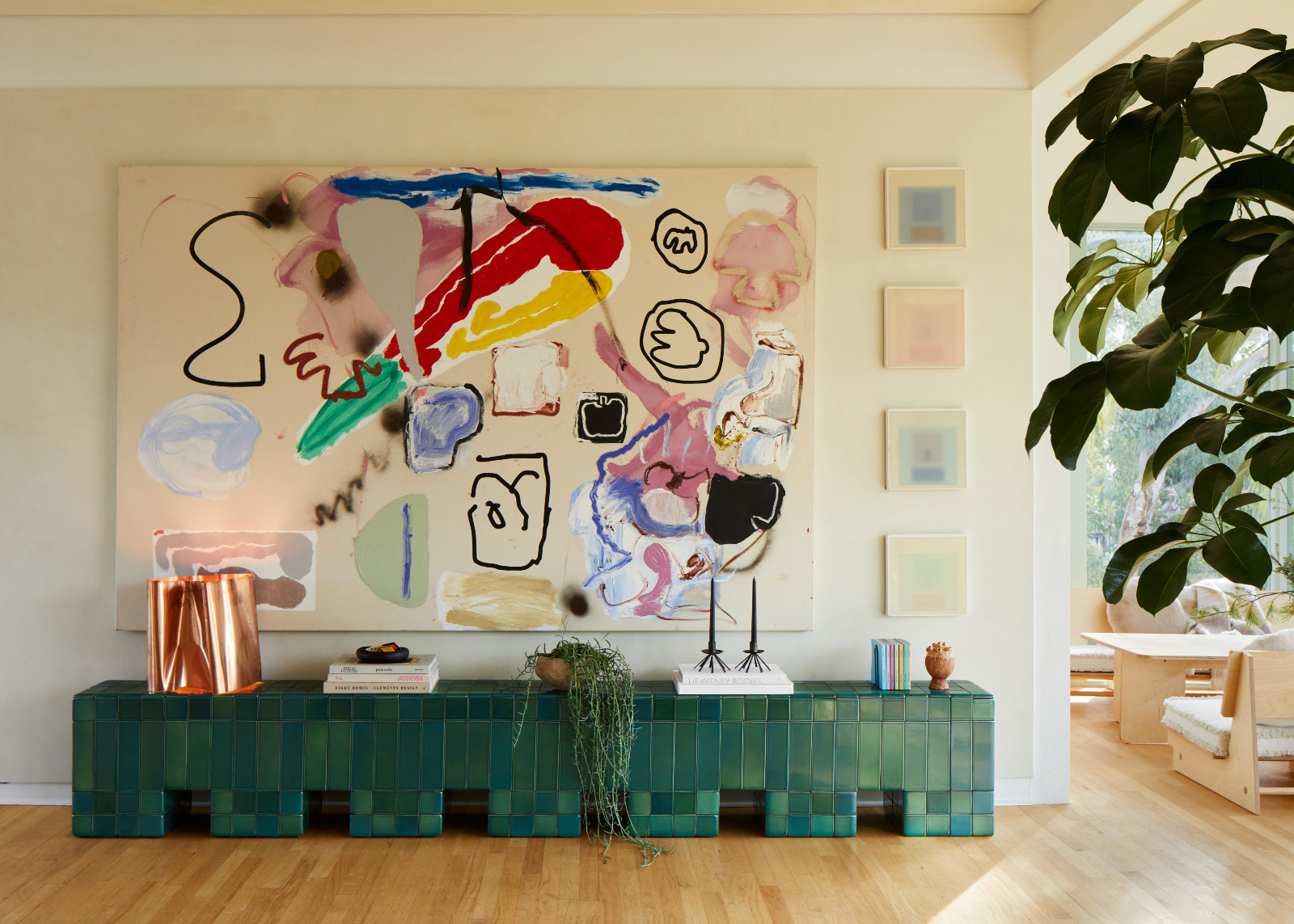 Artworks on display in the living room of the Beachwood Canyon Treehouse by Studio Keeta