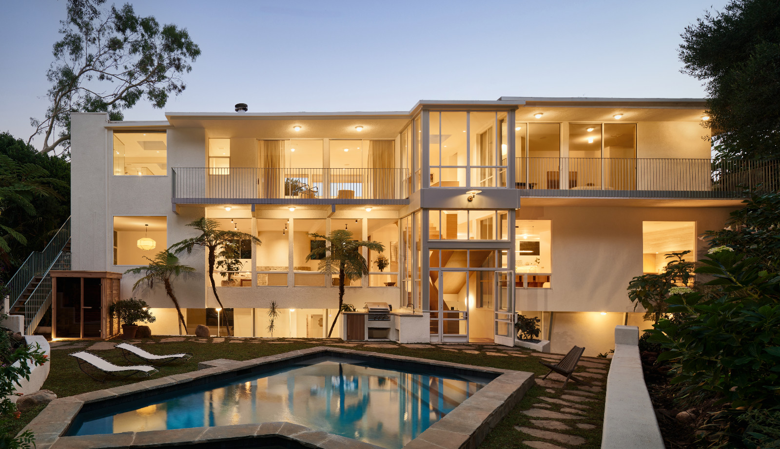 The external view of A Quincy Jones' renovated home, designed by Ome Dezin in Los Angeles, California