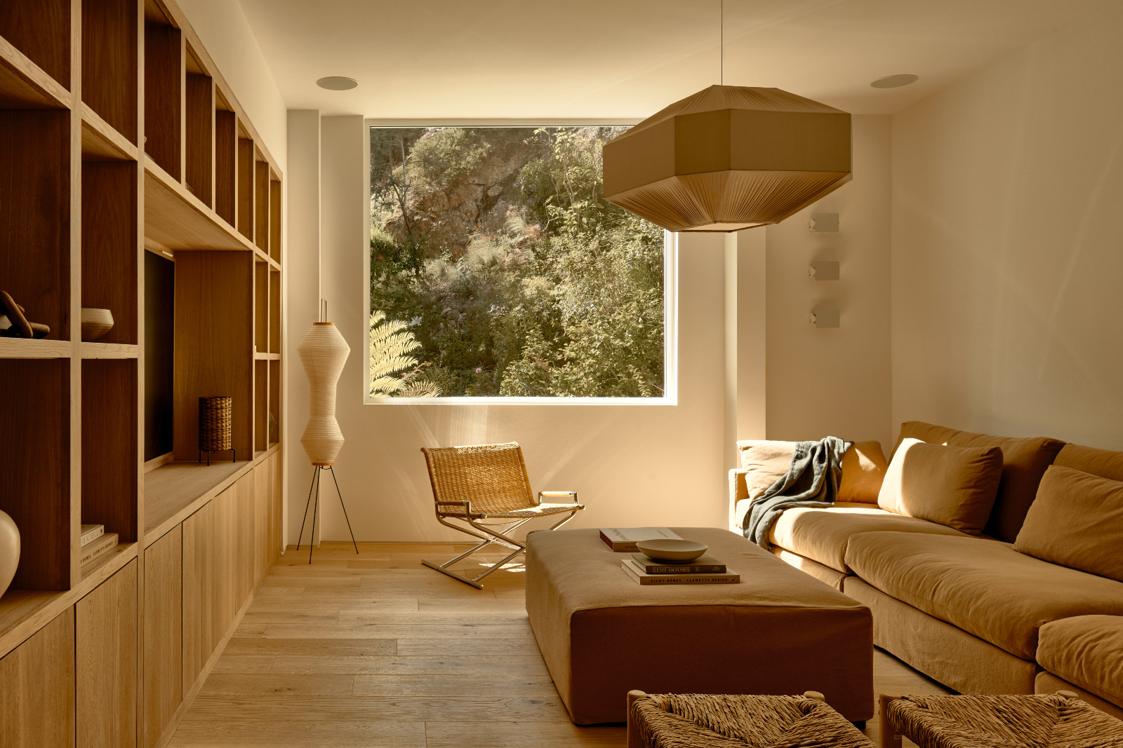The lounge area of A Quincy Jones' renovated home, designed by Ome Dezin in Los Angeles, California