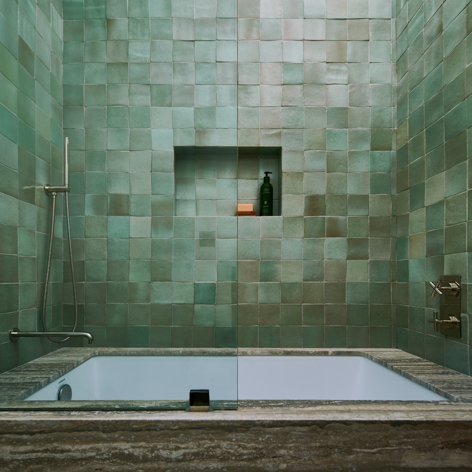 The bathroom of A Quincy Jones' renovated home, designed by Ome Dezin in Los Angeles, California