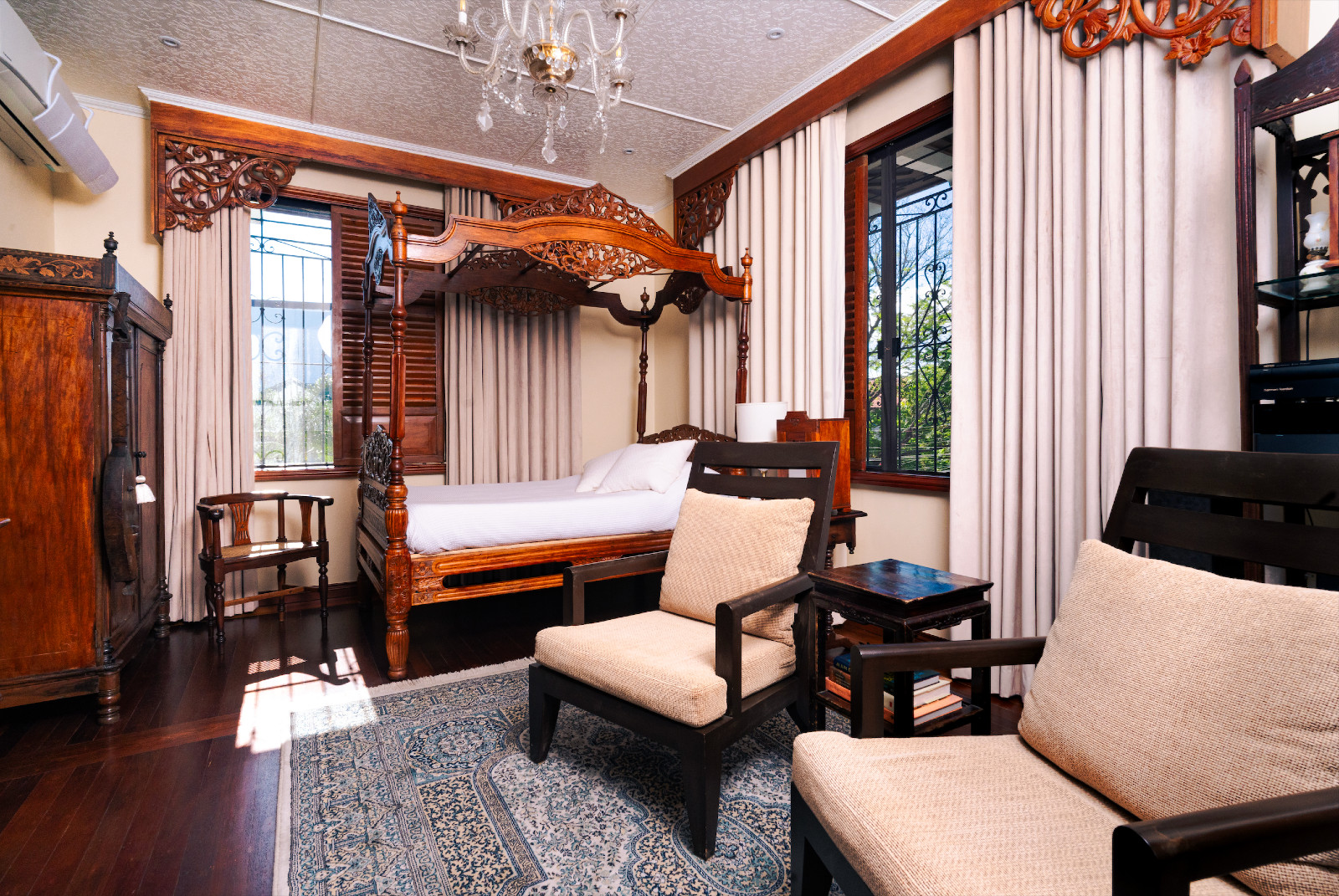 The bedroom on the second floor of Casa San Rafael, a home meticulously restored by Architect Jun Velez with homeowners Monette and Guita Saenz-Resurreccion in Parañaque, Manila