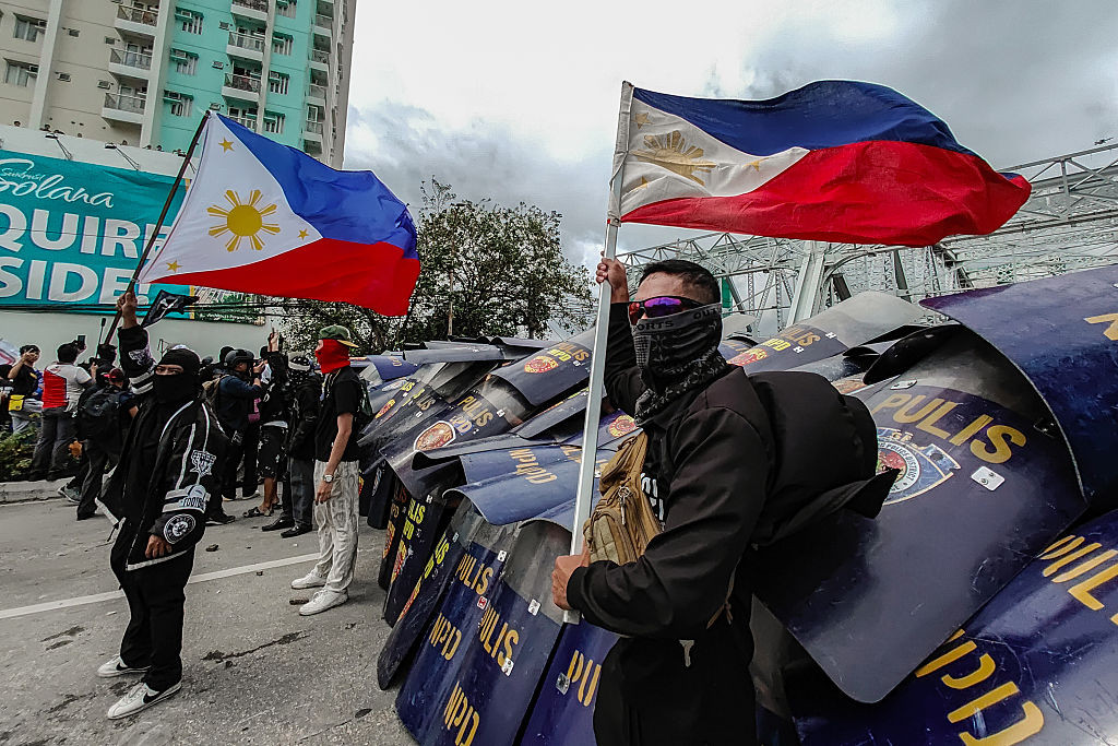 Gen Z protesters scuffle with the police as they try to reach the Malacanang compound during the mass protest in Manila, Philippines, on September 21, 2025, also dubbed as the Trillion Peso March (Photo: Getty Images)