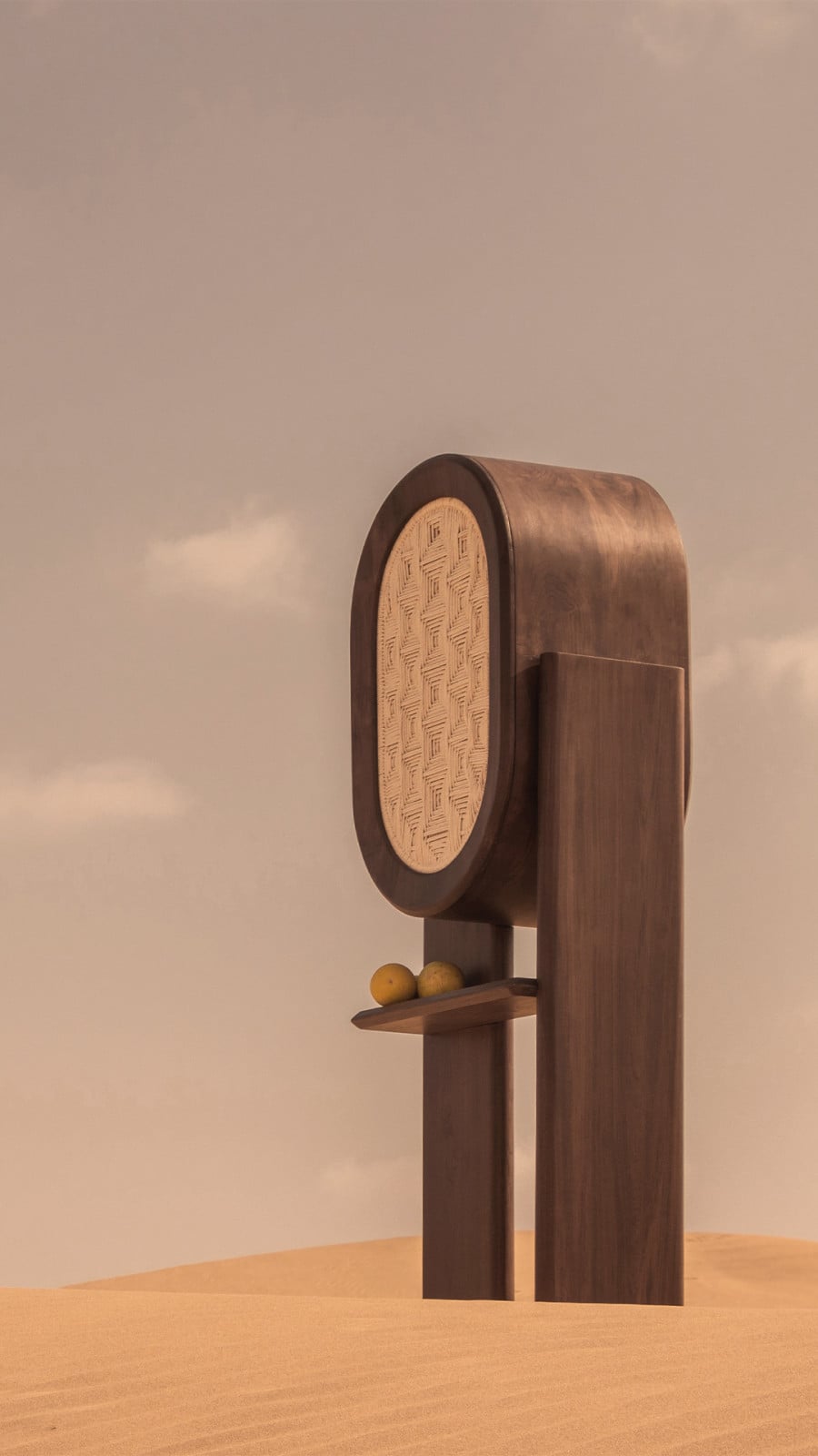 Detail of bar cabinet showing hand-carved woven panel inset within curved teak frame, demonstrating the precision joinery and surface carving characteristic of Rajasthani carpentry traditions