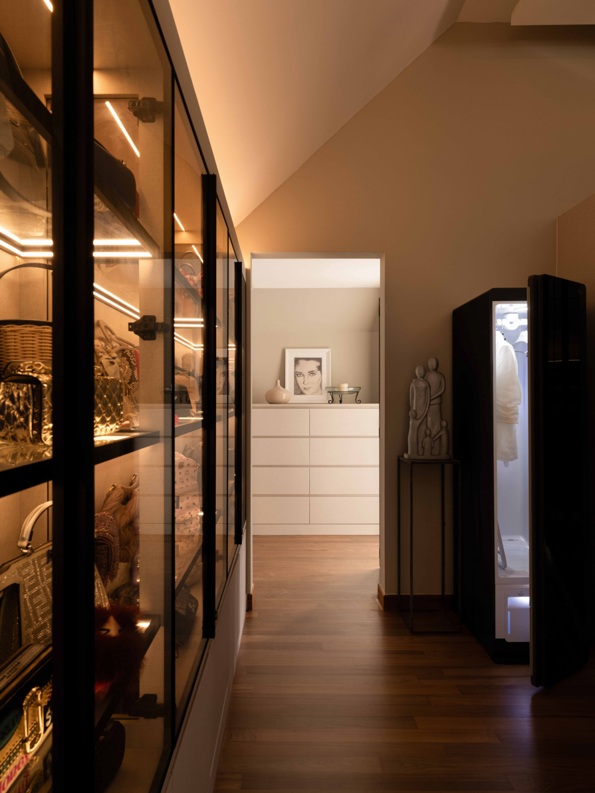The wife’s treasured handbags are on show in this dedicated display space