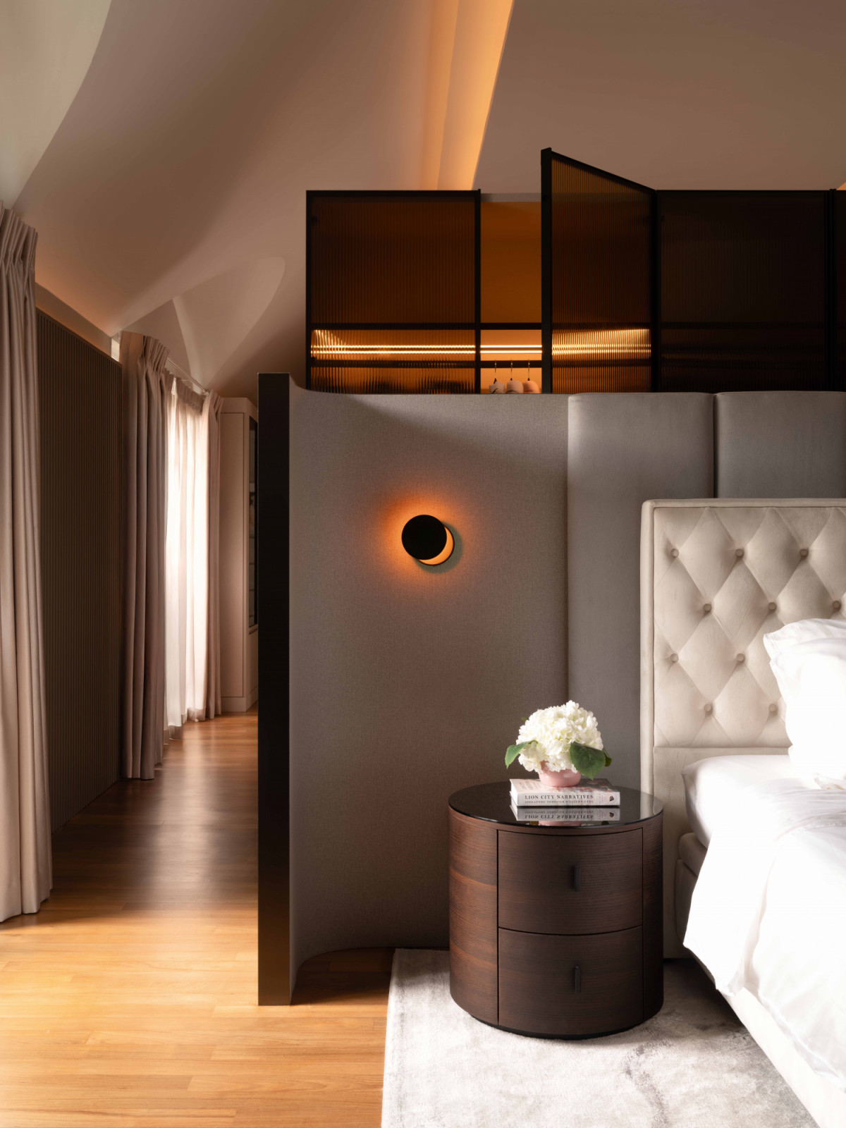Acoustic panels shield the bed from view and reduce distracting noise