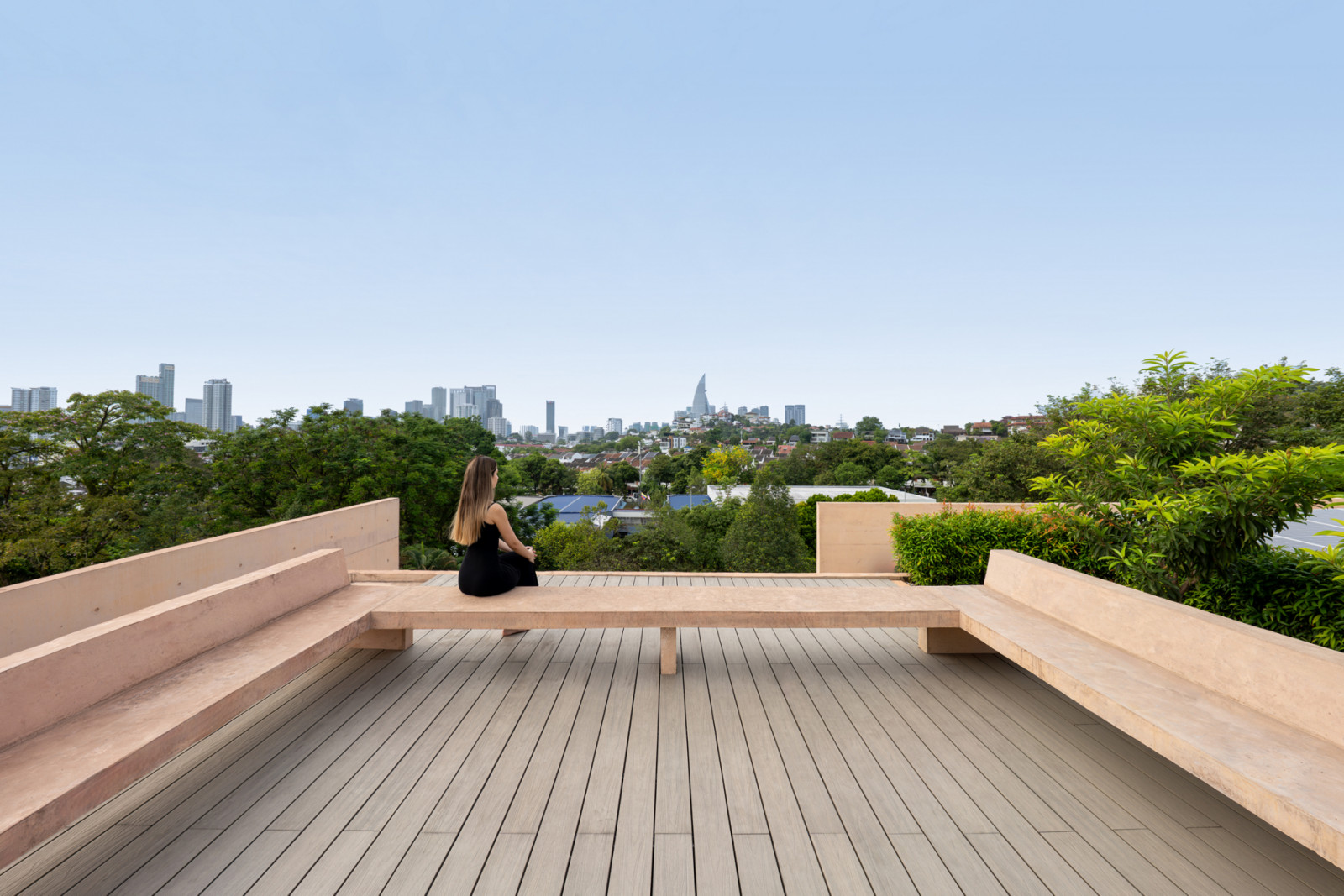 The rooftop deck, accessible via lift, provides panoramic views of the city and the surrounding neighbourhood