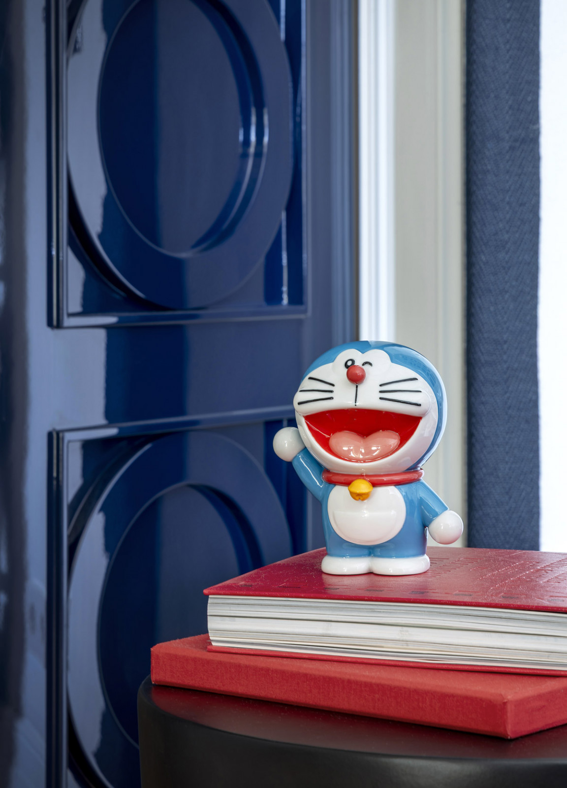 The Doraemon porcelain piece brings a surge of vibrancy and joy in his original palette