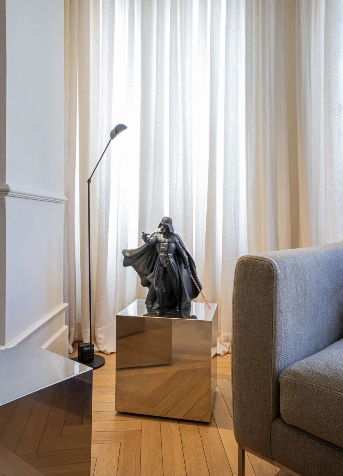 The Darth Vader sculpture by Lladró is rendered in matte black porcelain