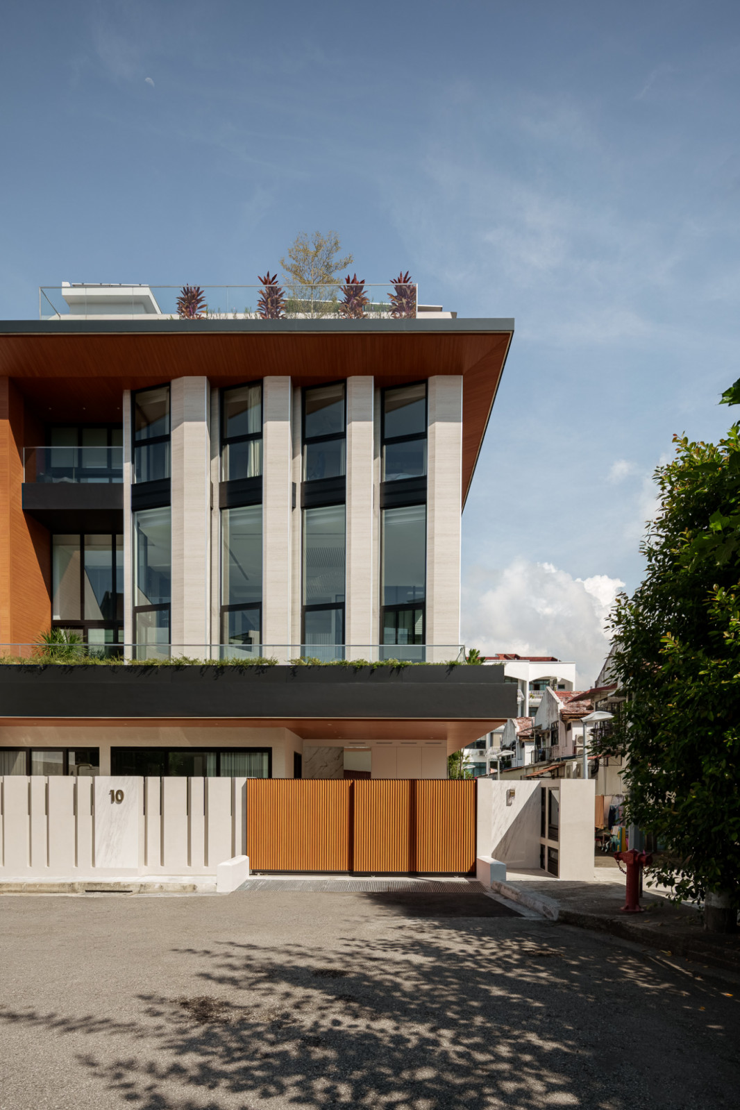 The facade of this two-storey multigenerational home transformed by Create Architecture