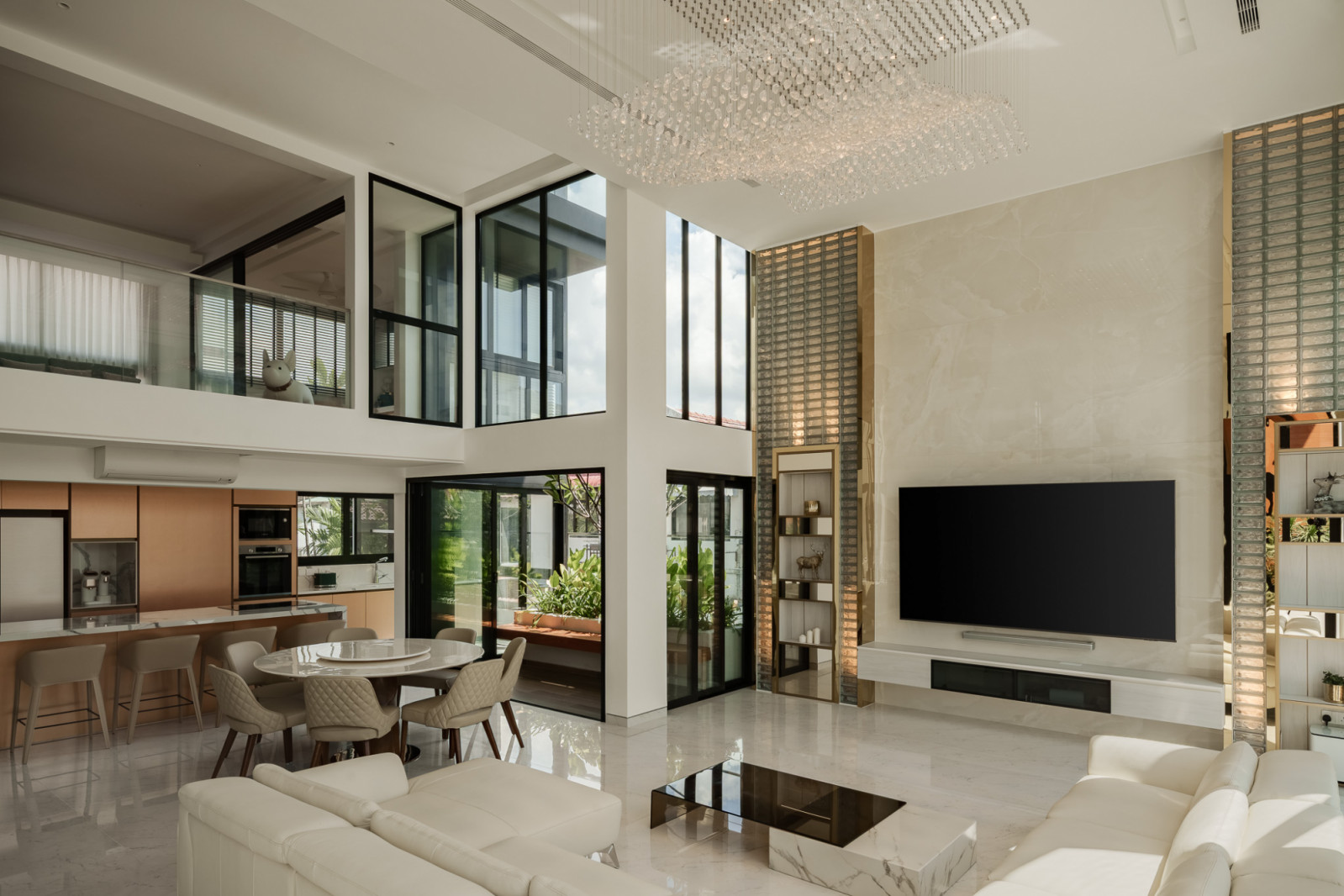 Another view of the living and dining zones, which benefit from a double-height ceiling