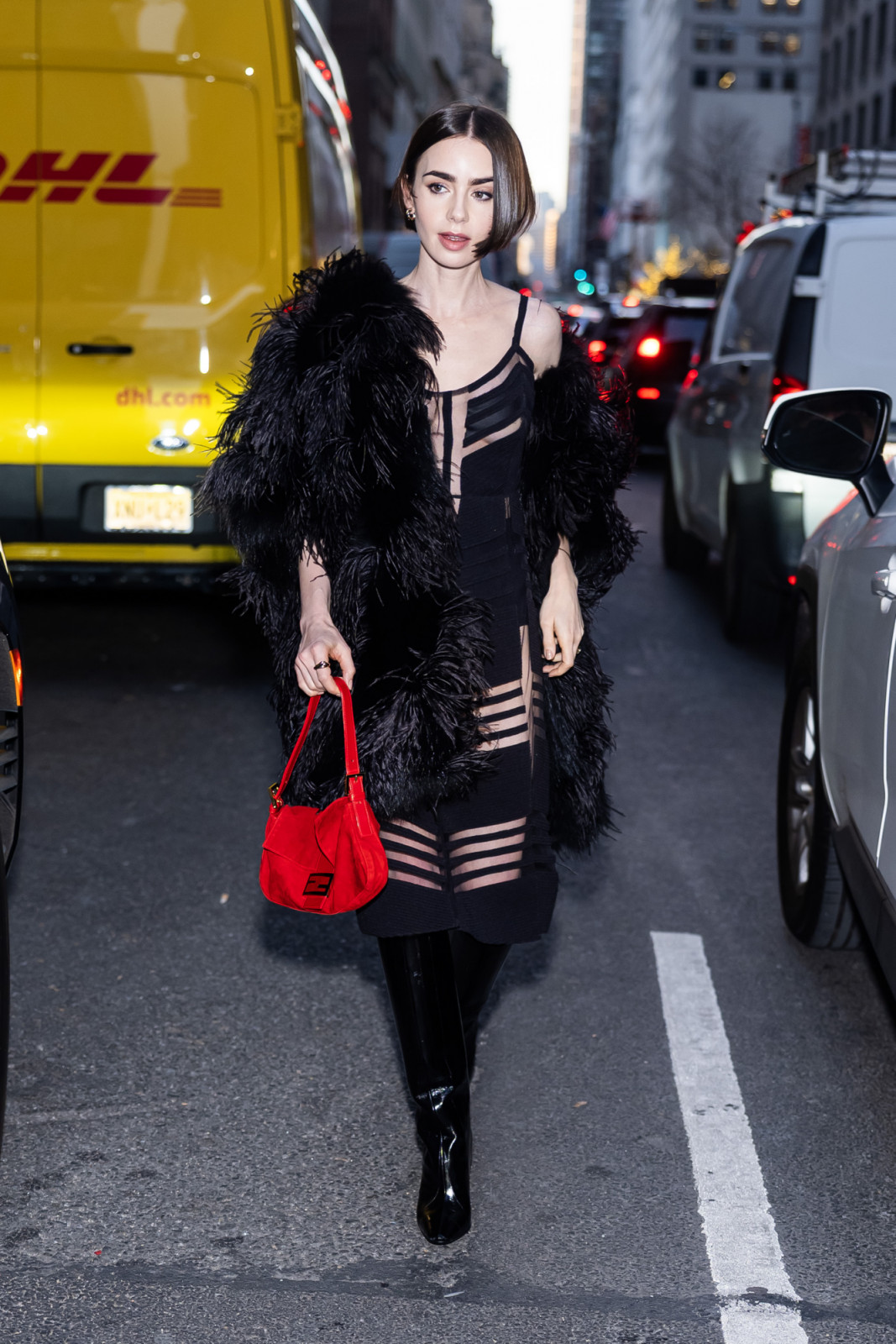 NEW YORK, NEW YORK - DECEMBER 09: Lily Collins is seen in Midtown on December 09, 2025 in New York City. (Photo by TheStewartofNY/GC Images)