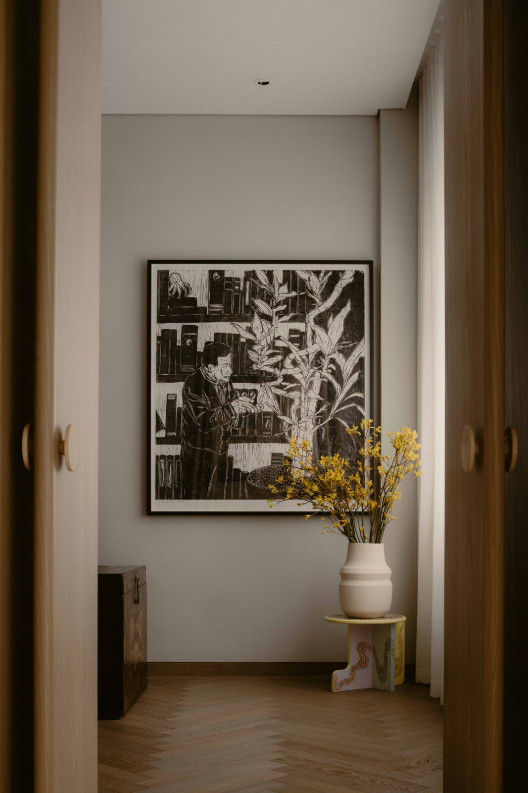 “Untitled” by Zhang Fuming, a 100 × 120 cm woodblock print, greets visitors entering Ho Douven’s home studio through the double doors