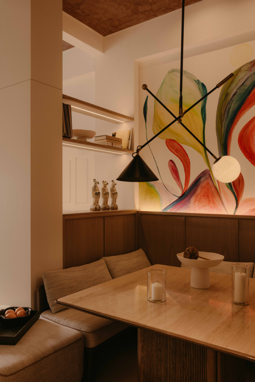 The dining area’s mural evokes a restaurant vibe