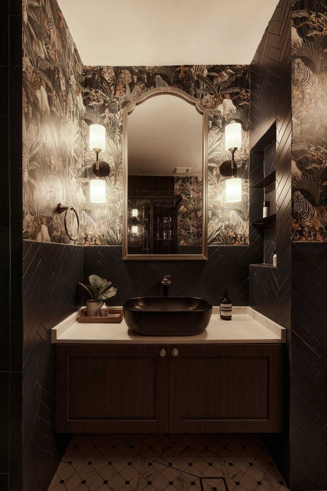 Soft lighting imbues this bathroom with a sultry air