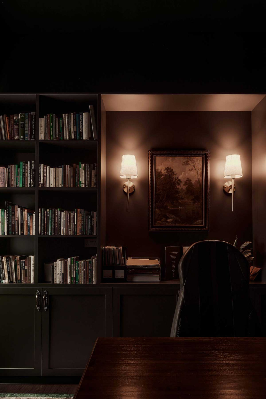 Warm, moody lighting in the study