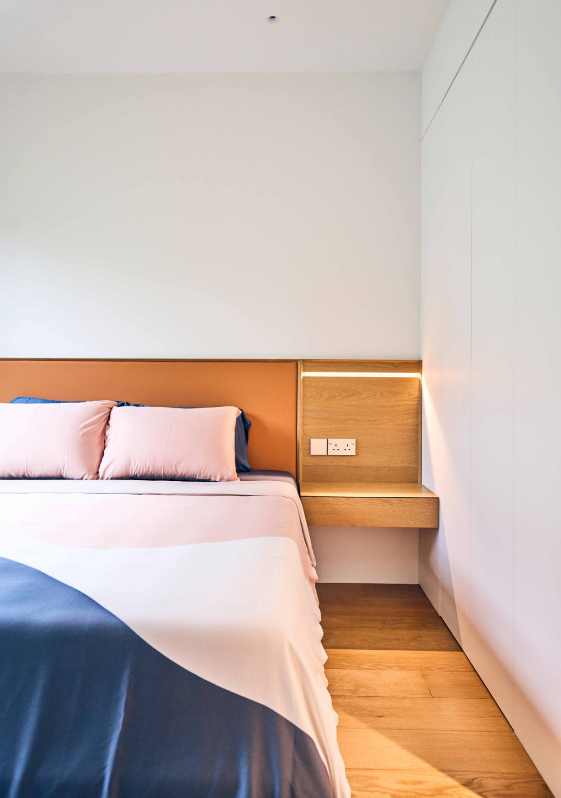 When closed, the door to the master bedroom wardrobe disappears into the wall