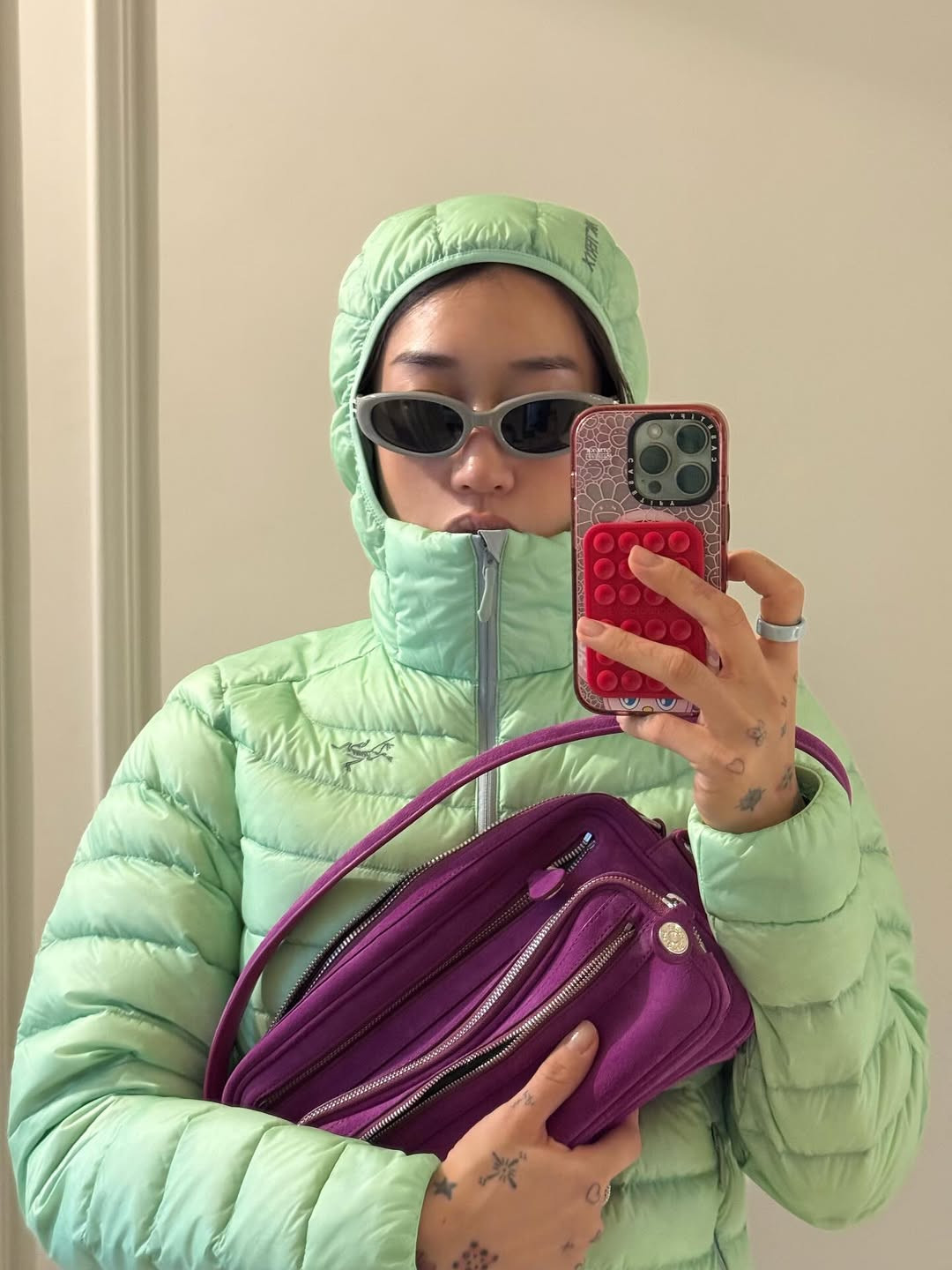 Cold weather staples lifted with saturated colour, worn as everyday layers rather than accents (Photo: Peggy Gou/Instagram)