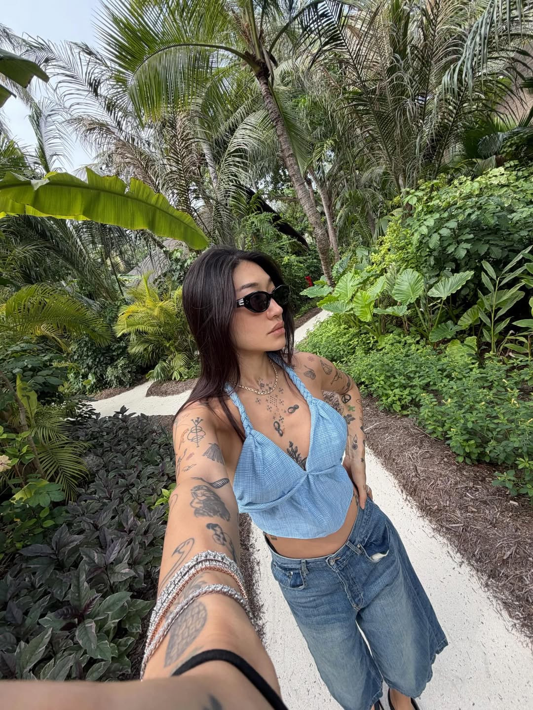 A relaxed double denim look that works off duty, balanced for sun, sand and movement (Photo: Peggy Gou/Instagram)