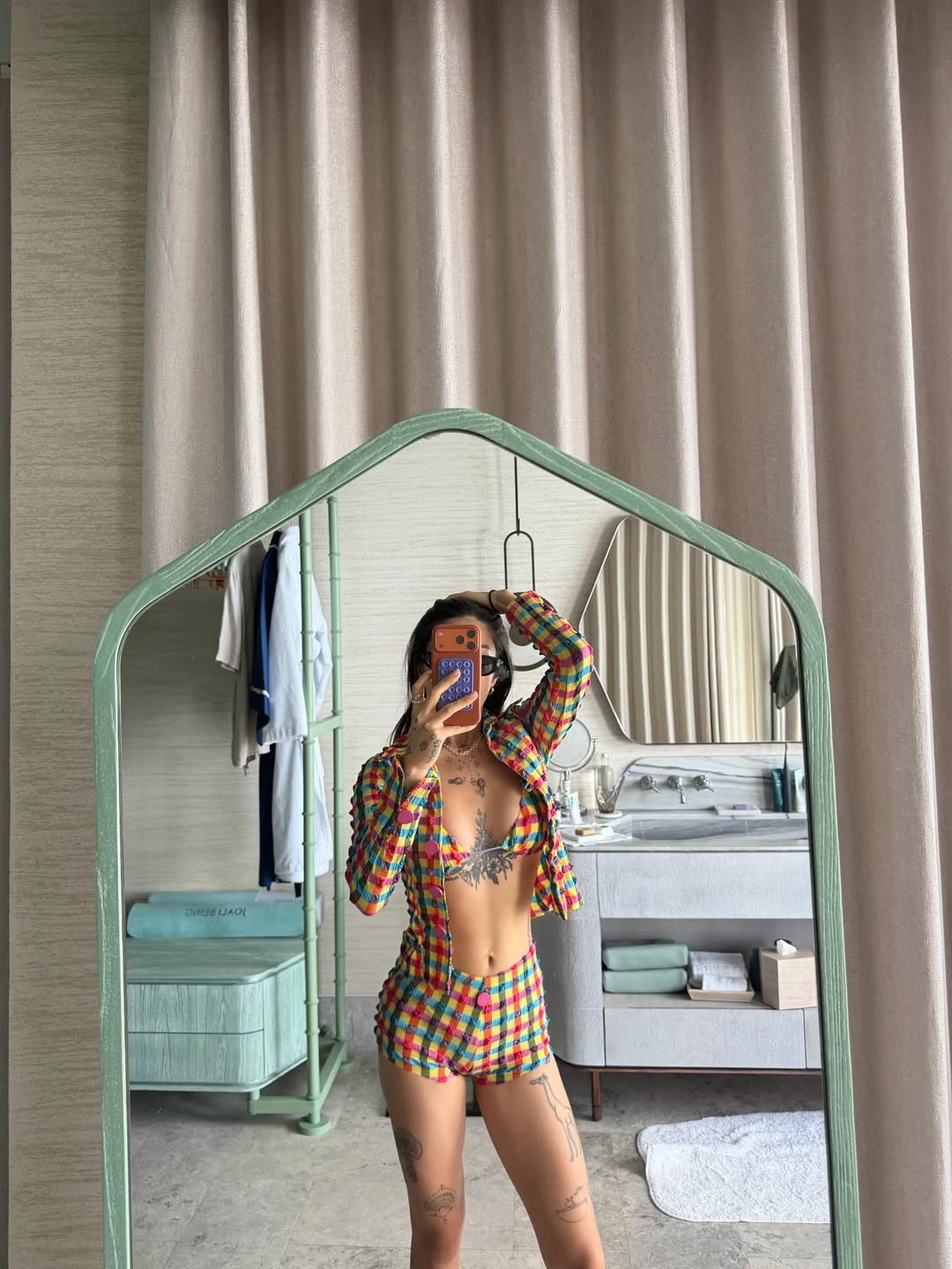 Swimwear styled as clothing, with lightweight layers that carry easily from water to street (Photo: Peggy Gou/Instagram)