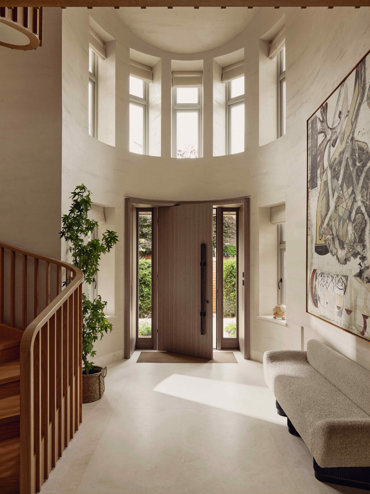 The clean lines and modern architecture of the three-storey high entrance void