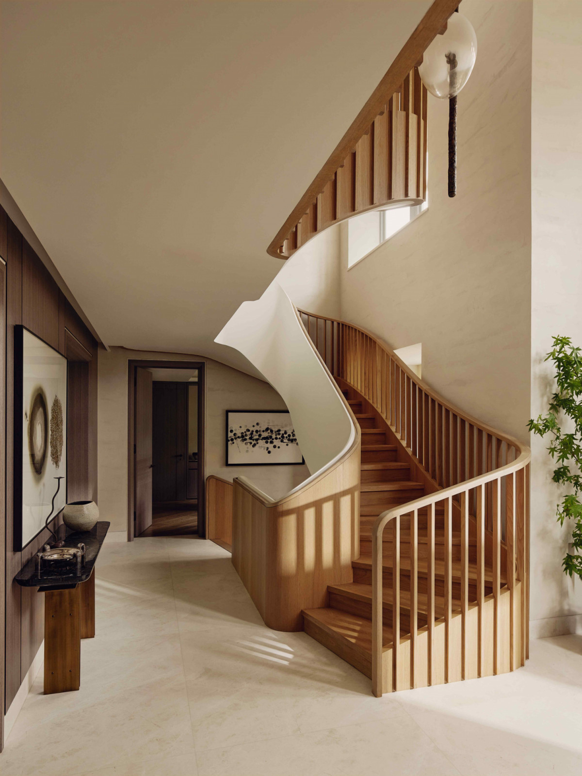 The sculptural staircase, designed in collaboration with Harper Latter Architects