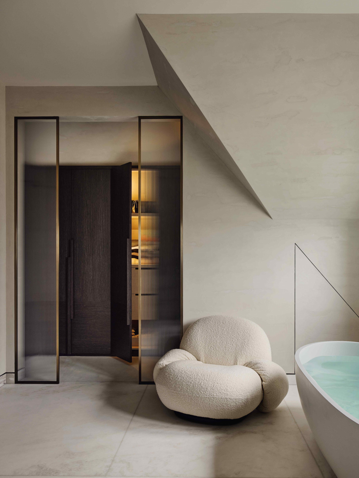 A wardrobe area tucked away in the corner