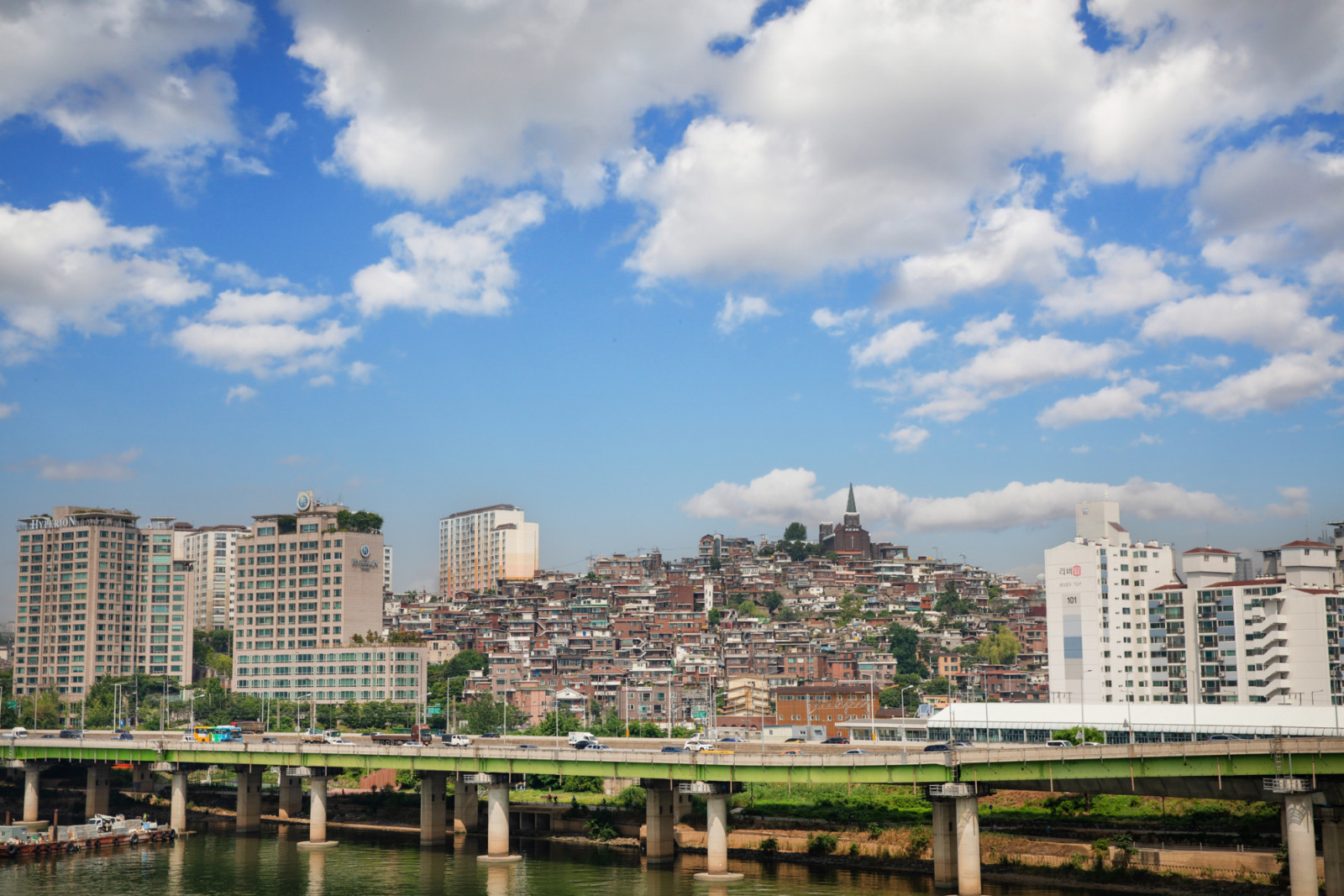 Seoul’s residential landscape contrasts luxury high-rises and hillside neighbourhoods across the Han River, where South Korea’s chaebols cluster in elite districts (Photo: Getty)