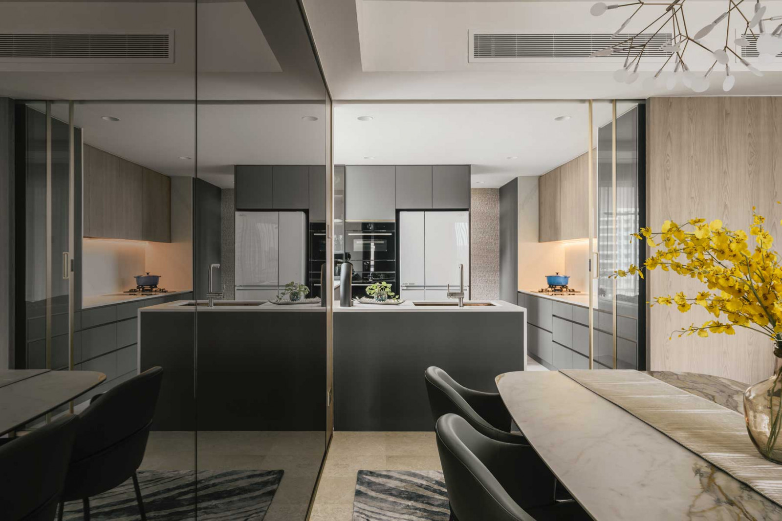 A peek at the streamlined kitchen from the dining area