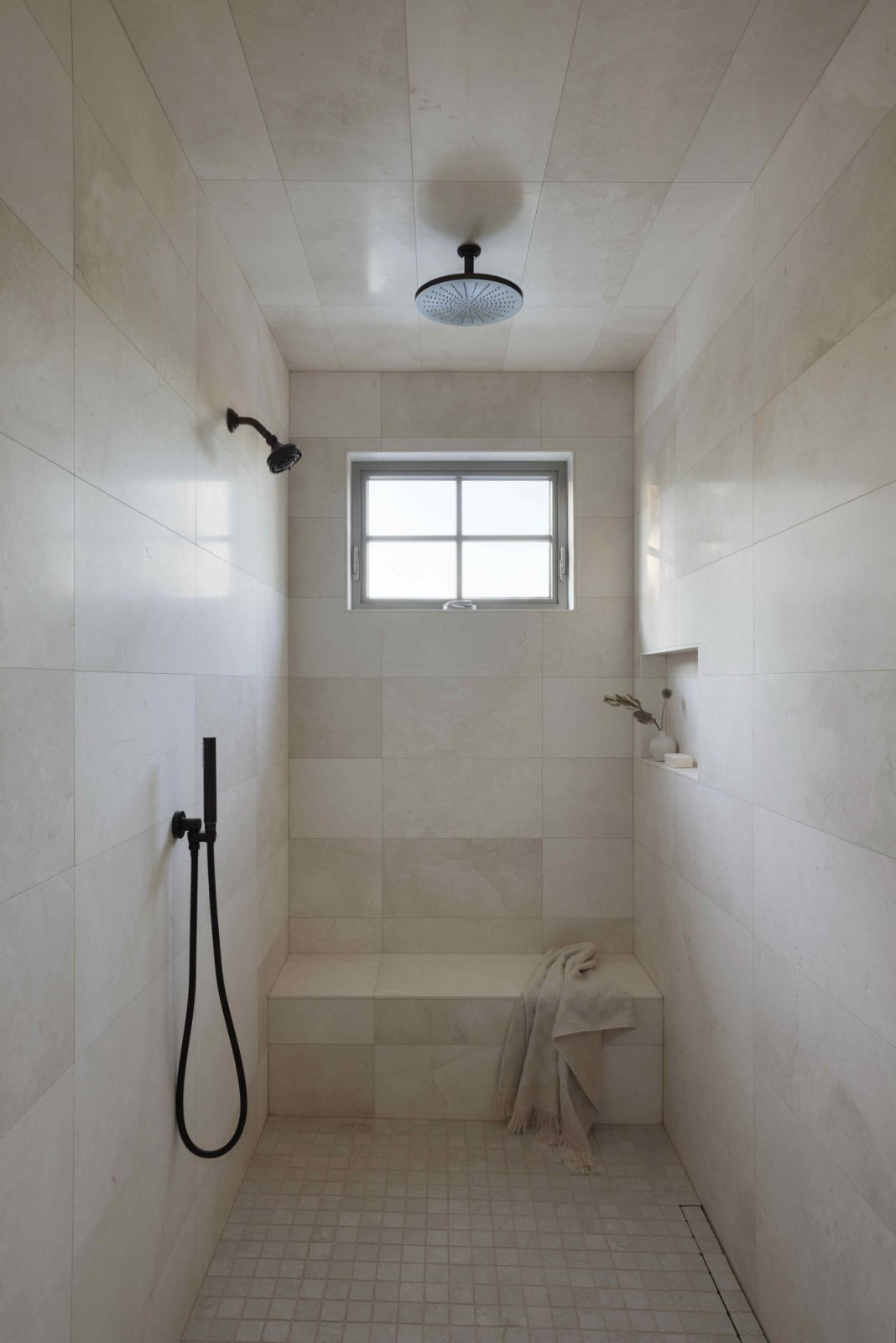 The limestone-wrapped 13-foot shower (Photo: Ema Peter)