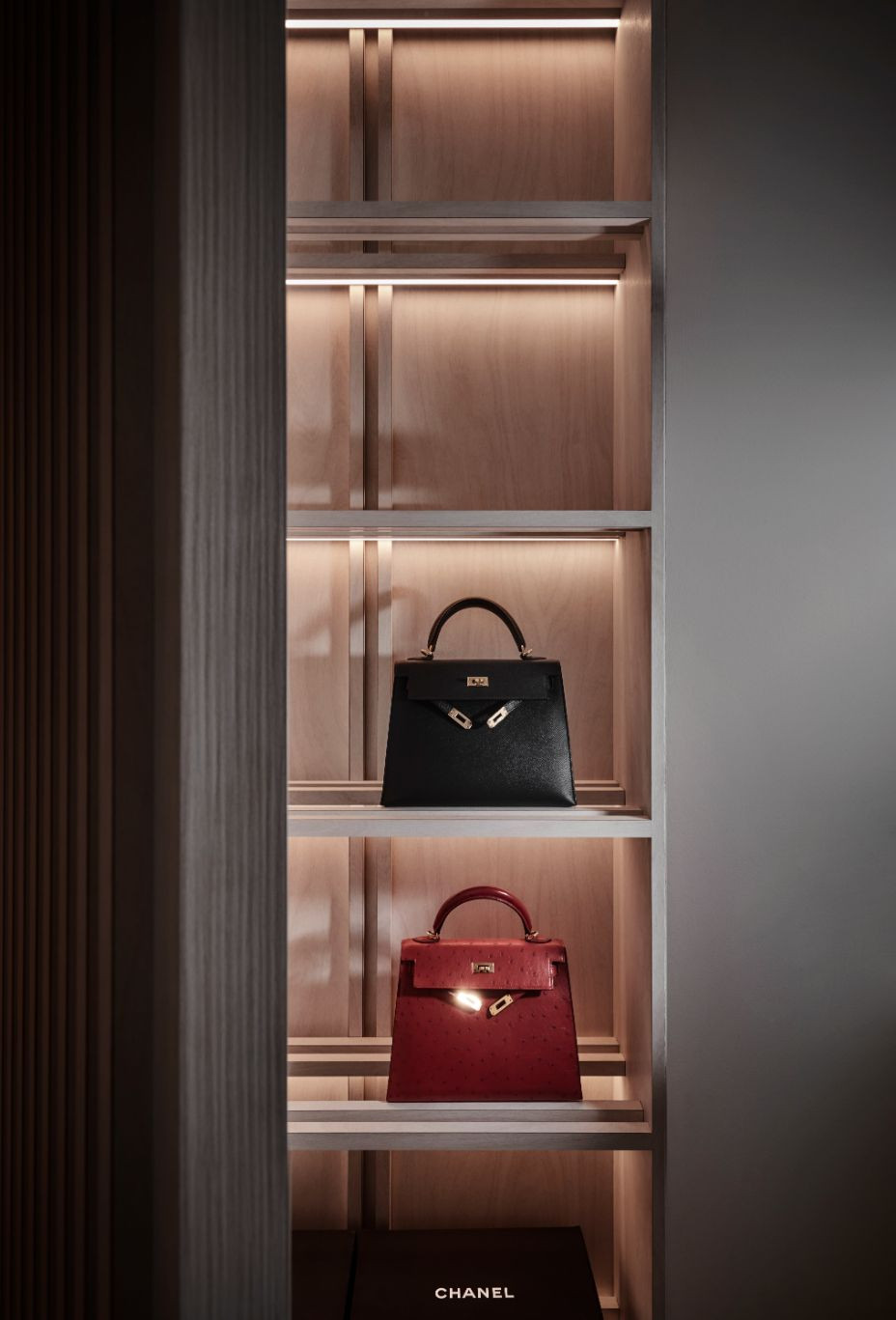 The bespoke handbag closet features backlit displays (Photo: Wong Weiliang / 328 Productions)