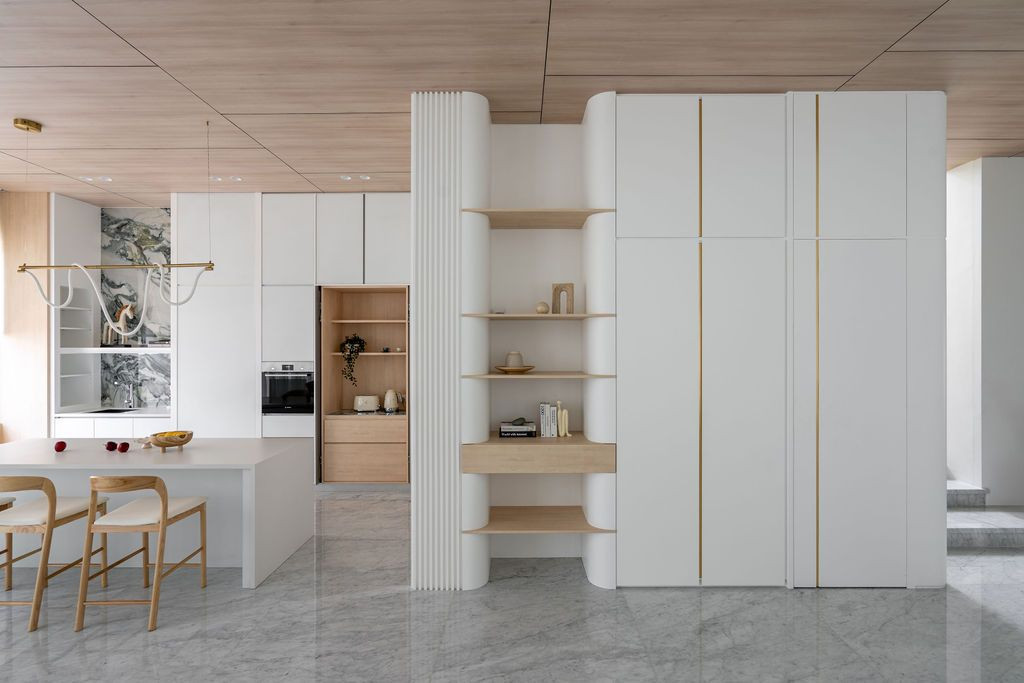 Strategically integrated storage solutions maintain uncluttered and functional interiors (Photo: Bricksbegin)