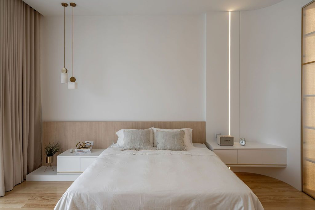 The bedroom balances contemporary aesthetics with warmth and practicality (Photo: Bricksbegin)