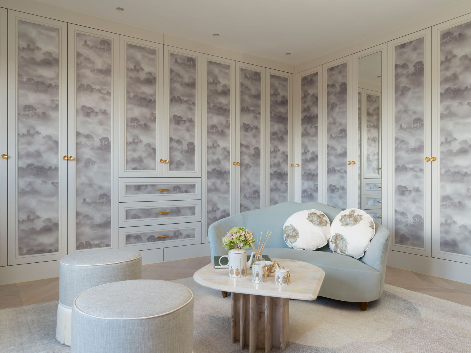 Cloud-patterned panels decorate the walk-in wardrobe (Photo: Rich Gooding)
