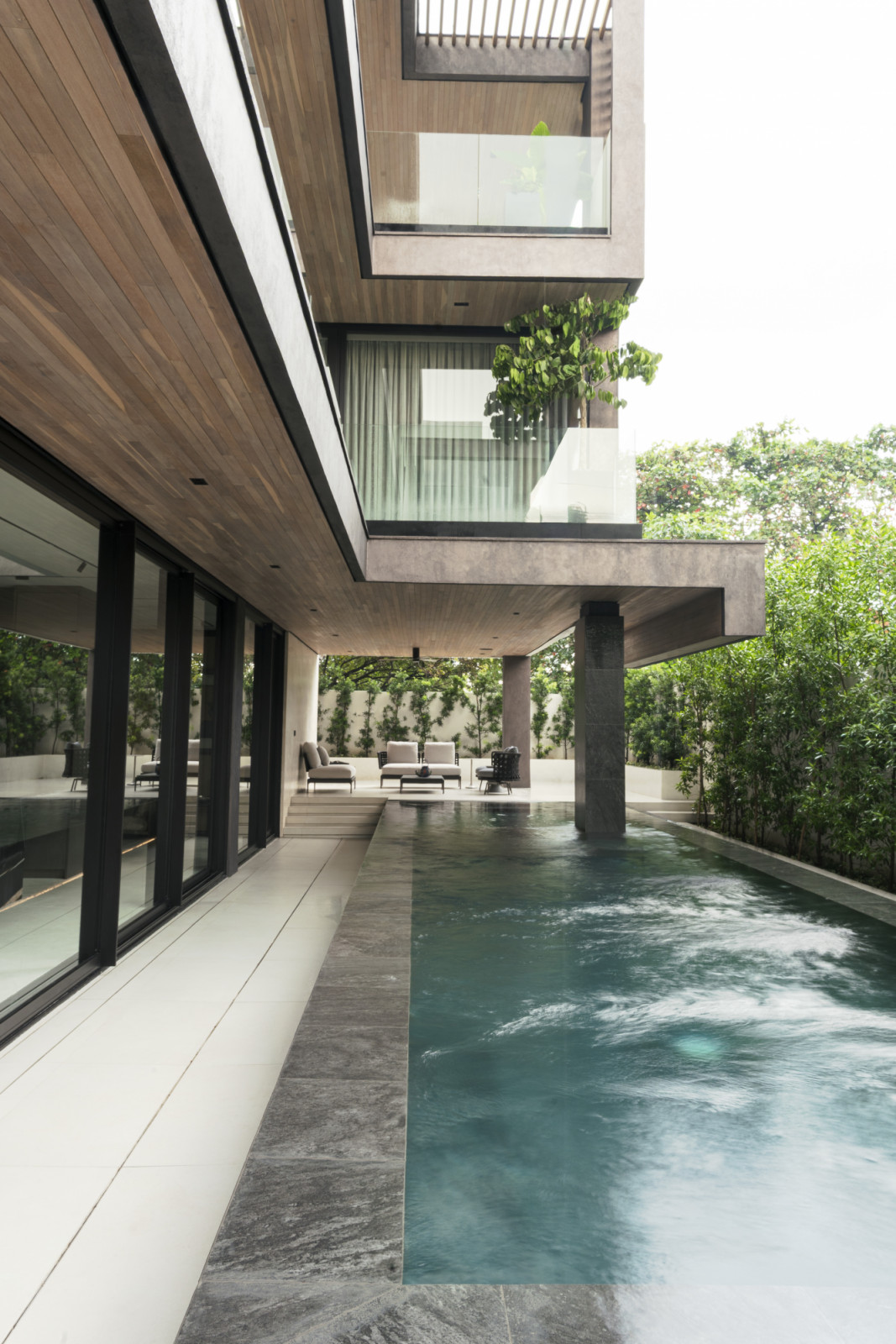 The pool area designed by Ed Calma is an oasis of serenity