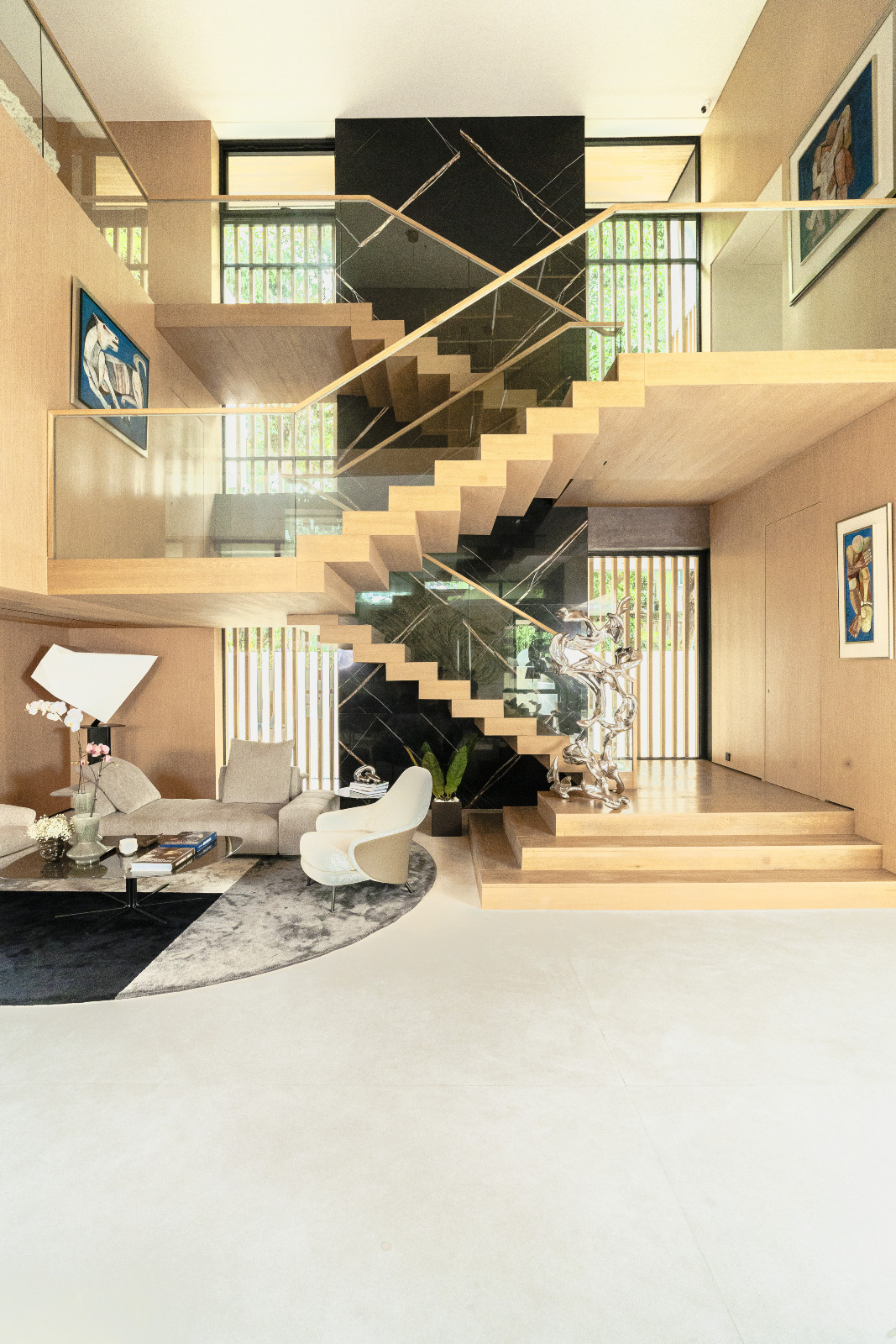 The staircase is a visual symphony of zigzag lines that soothe the viewer’s gaze in a home designed by Ed Calma