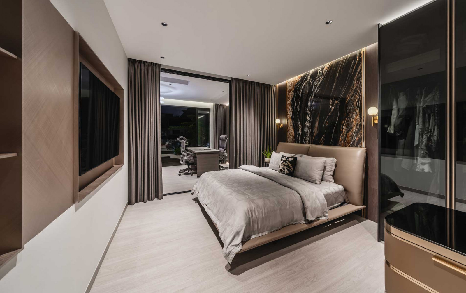 Summerhaus D’zign Serangoon terrace house - the black-and-gold master bedroom is anchored by a slab of Magma Gold granite