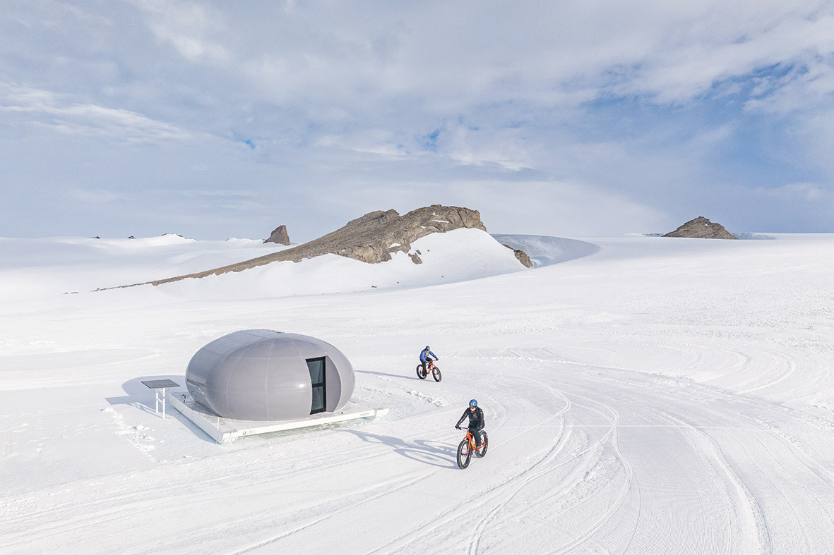 Cycling outside the echo pods at the White Desert Adventure Camp