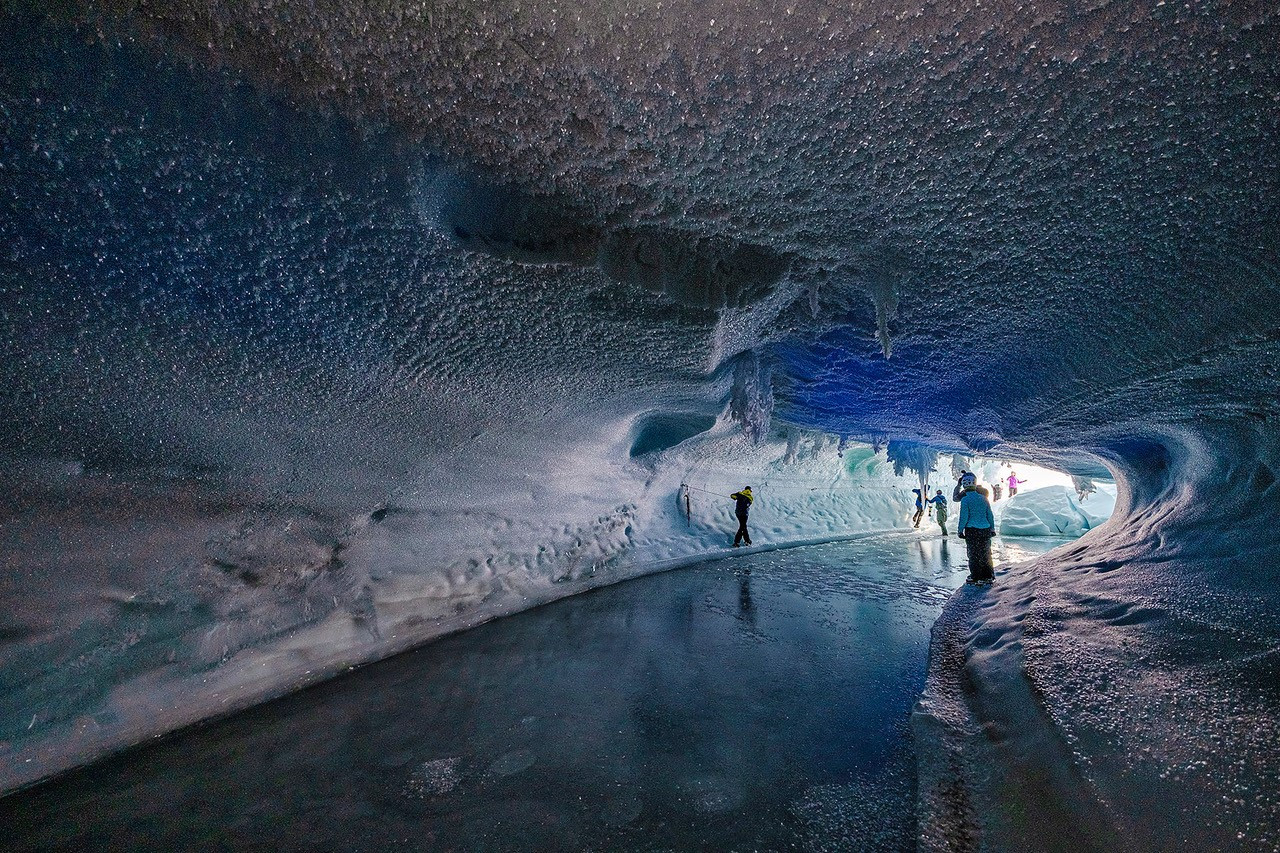 Trekking through the blue ice tunnels. Photo: White Desert