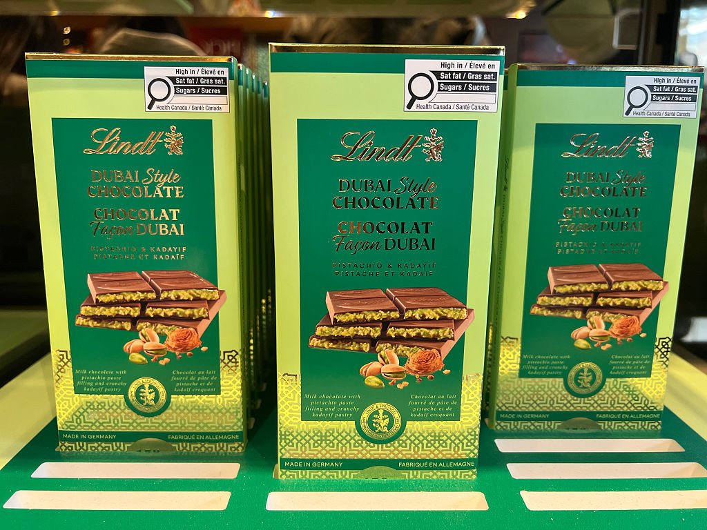 Lindt Dubai style pistachio kunafa chocolate bars are displayed in Newmarket, Ontario, Canada, on September 20, 2025. The Dubai Pistachio Kunafa (kadayif) Chocolate combines creamy milk chocolate, crunchy kunafa, and rich pistachios. (Photo by Creative Touch Imaging Ltd./NurPhoto via Getty Images)