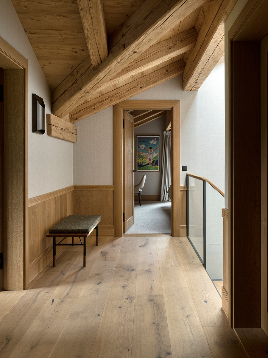 The hallway of the private quarters in the Klosters, Switzerland family chalet, designed by Tollgard Studio
