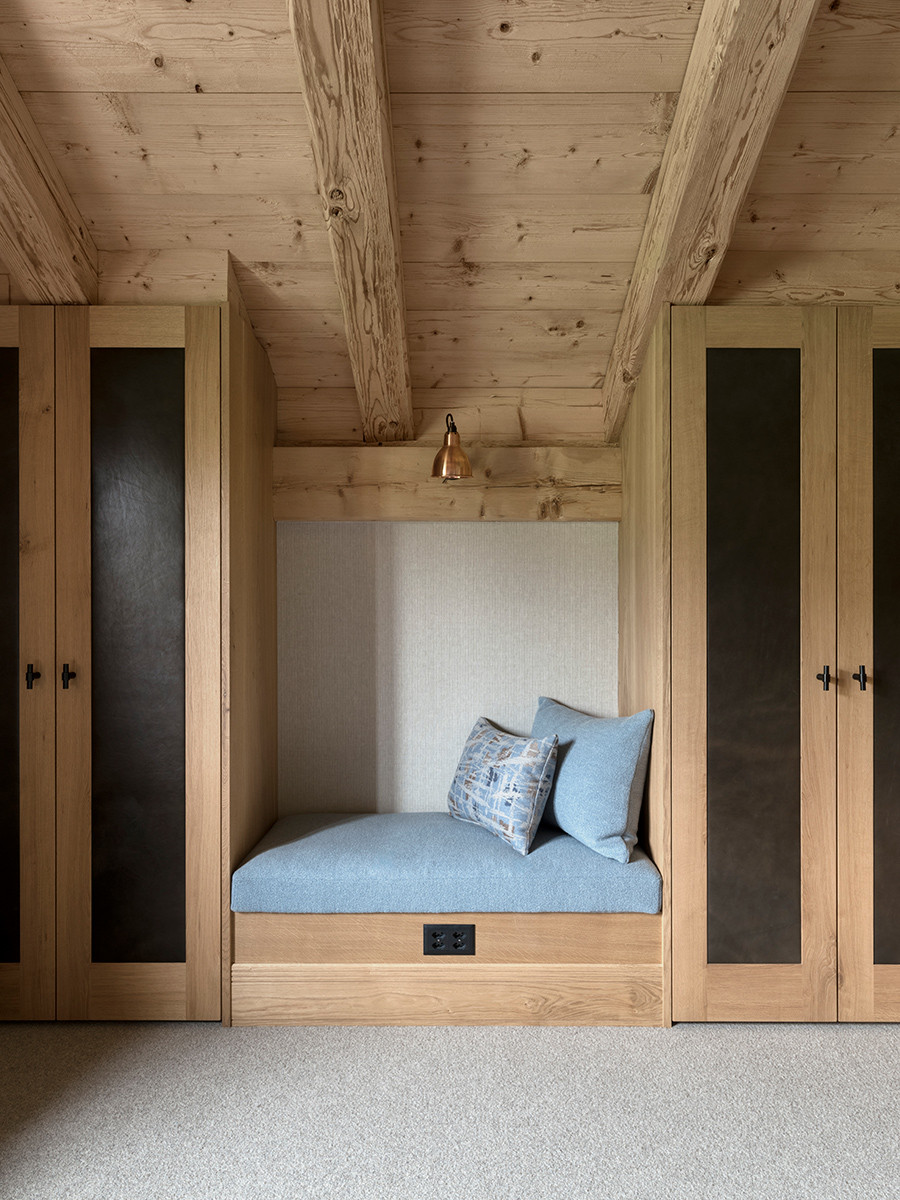 A cosy nook of the Klosters, Switzerland family chalet, designed by Tollgard Studio
