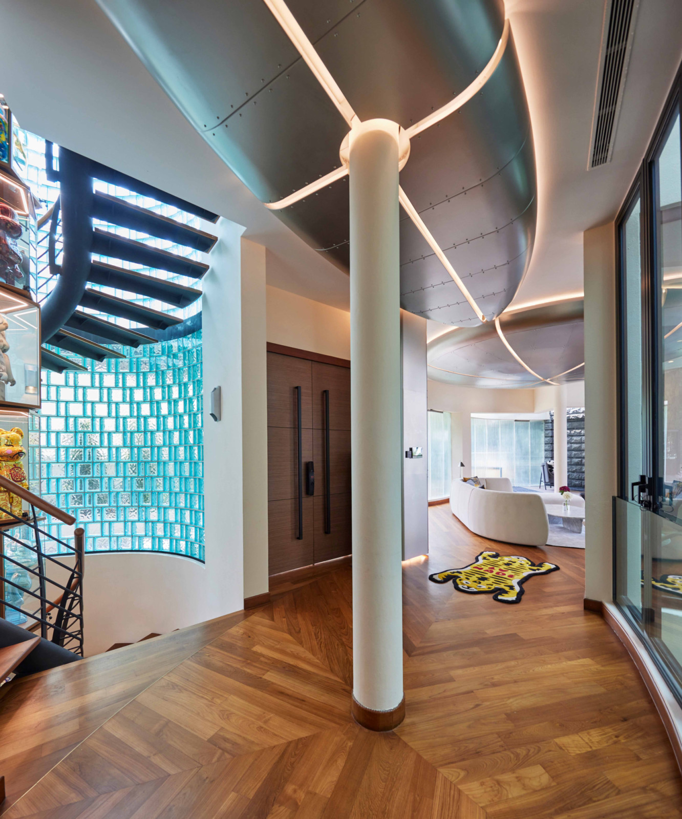 Located beside the spiral staircase, the elevator ensures easy access across all levels